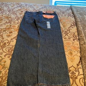 Levi’s 501 - Straight leg and Button -Fly ( New) Size waist 30 and length 32.